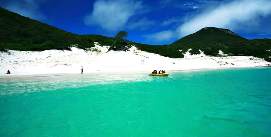 From Rio: Arraial do Cabo - The Brazilian Caribbean Daytrip - Boat stops that shape the whole day: Farol, Gruta Azul, and water time