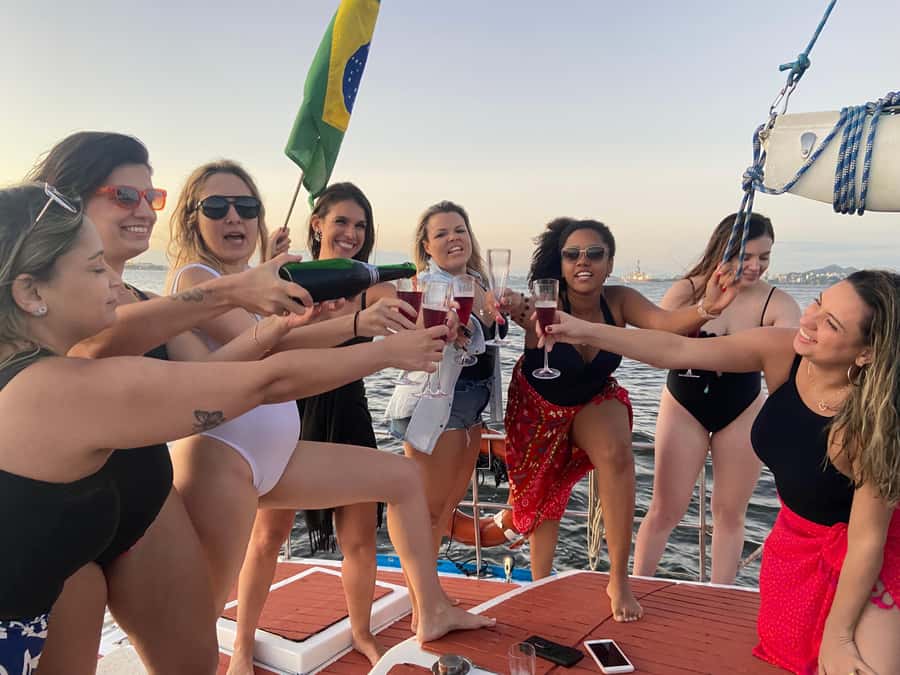 Rio de Janeiro: Sunset Sailboat Tour with Open Bar - The Swim Stop: When You’ll Want a Towel and a Jacket