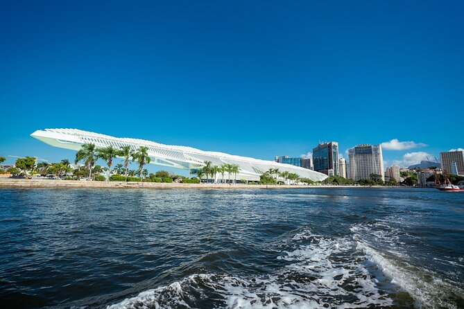 Sunset Boat Tour with Beer, Water, Soda and Snacks included - Stop 3: Adão e Eva Beach swimming break (the highlight if you like getting your feet wet)